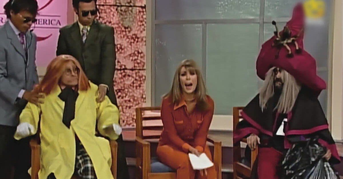 El profesor Memelovsky y el Ecoloco arreglan sus diferencias en un talk show